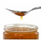 cuillere a miel Gourmet en situation sur un pot de miel chez Tresors de la Ruche